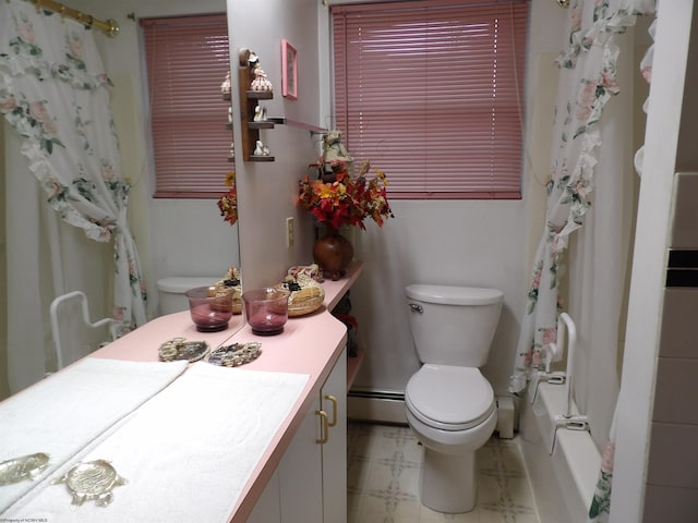 full bathroom featuring toilet, shower / tub combo, baseboard heating, tile flooring, and vanity