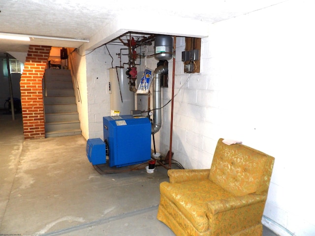 utility room featuring gas water heater