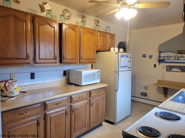 kitchen with a baseboard heating unit, tasteful backsplash, light tile floors, ceiling fan, and white appliances