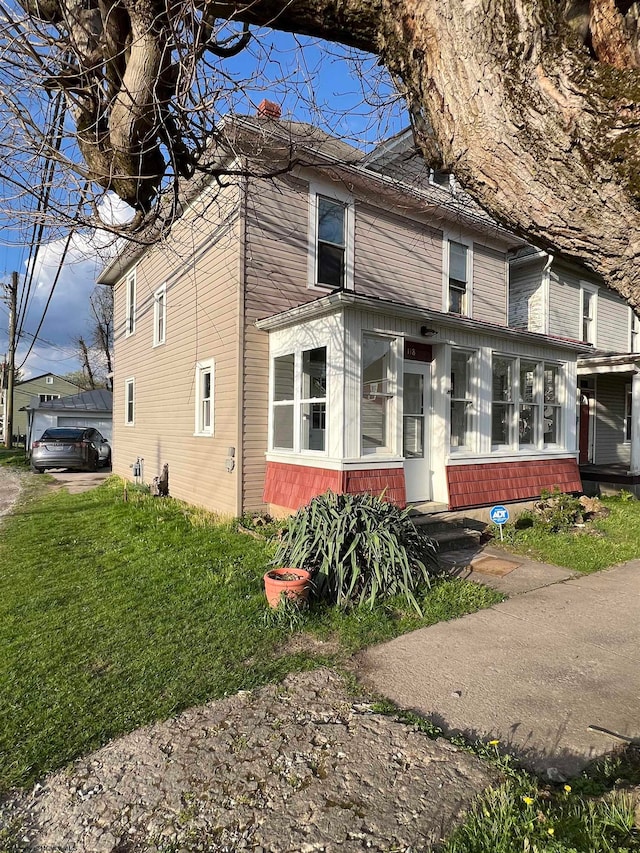 view of front property with a front lawn