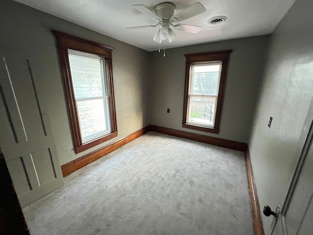 spare room featuring ceiling fan