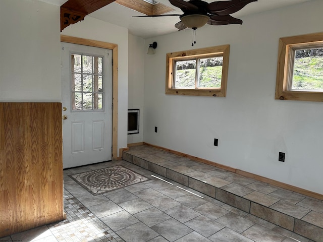 foyer featuring ceiling fan