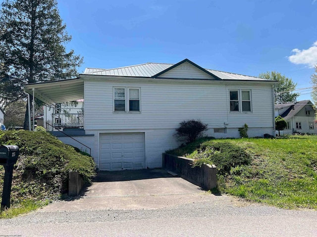 view of property exterior with a garage