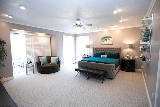 carpeted bedroom with ornamental molding, ceiling fan, a textured ceiling, and multiple windows