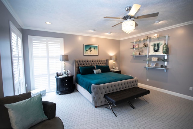 carpeted bedroom with ceiling fan, crown molding, and a textured ceiling