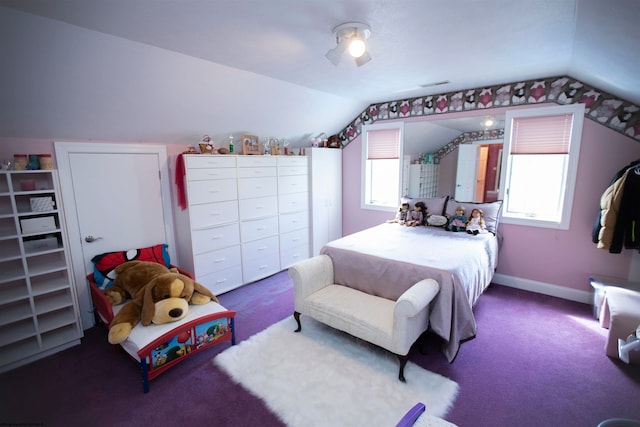 bedroom with carpet flooring and lofted ceiling