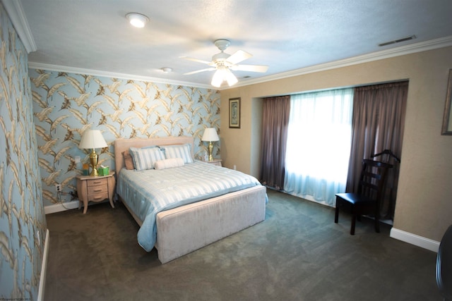 carpeted bedroom with ceiling fan and ornamental molding