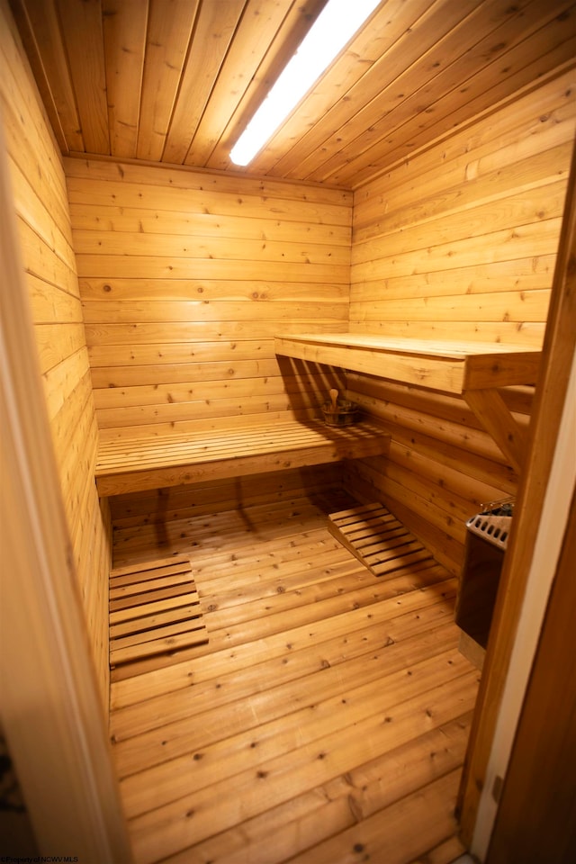 view of sauna with wood ceiling and hardwood / wood-style floors