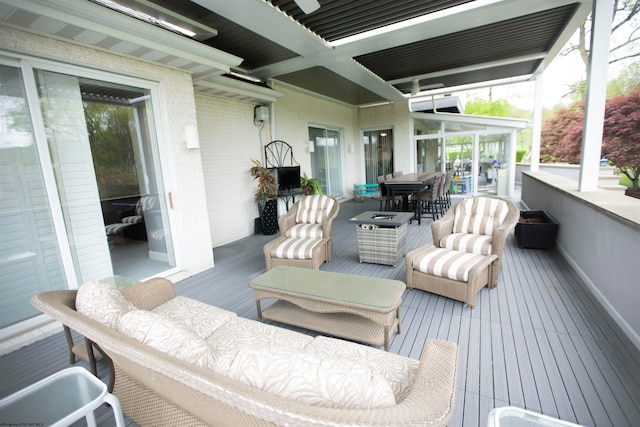 deck featuring an outdoor hangout area