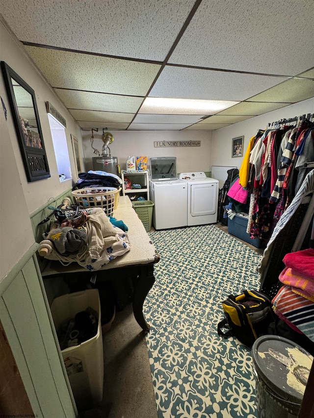 washroom featuring washer and dryer and water heater