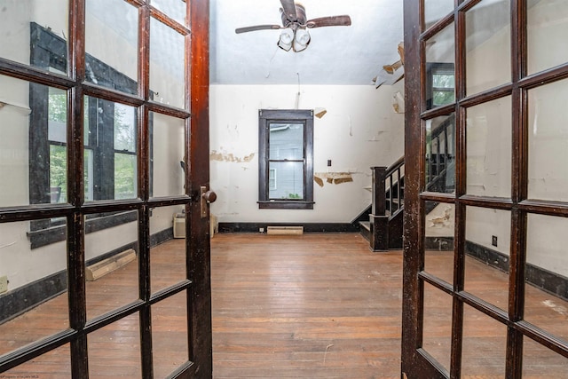 foyer featuring ceiling fan and hardwood / wood-style flooring