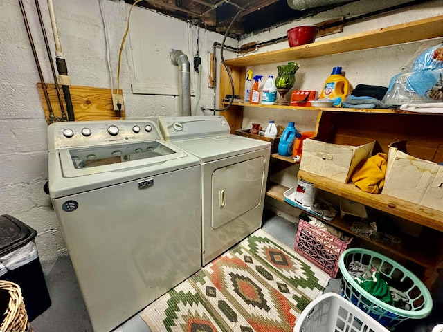 laundry room with separate washer and dryer