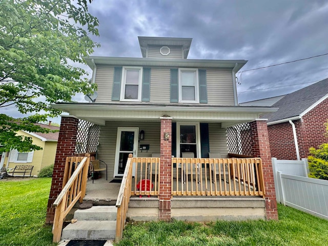 view of property with covered porch