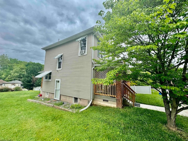 rear view of house with a yard