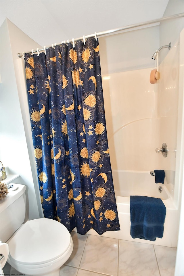 bathroom with toilet, tile floors, and shower / bathtub combination with curtain