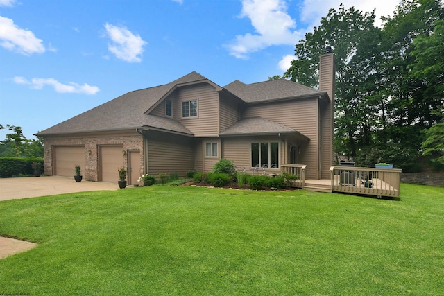 view of front facade featuring a deck, a front lawn, and a garage