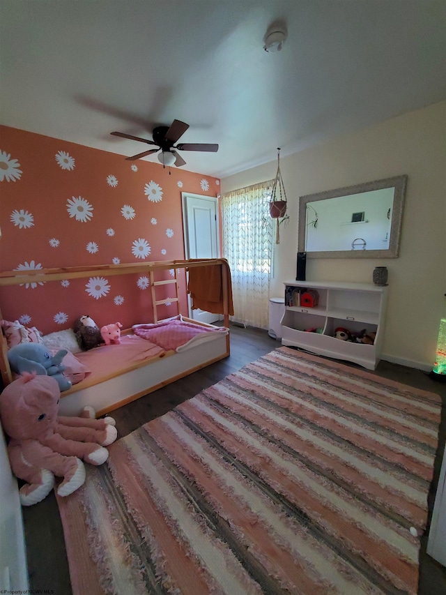 bedroom with hardwood / wood-style flooring and ceiling fan