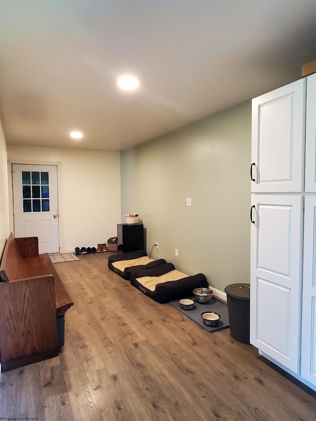 interior space with hardwood / wood-style floors