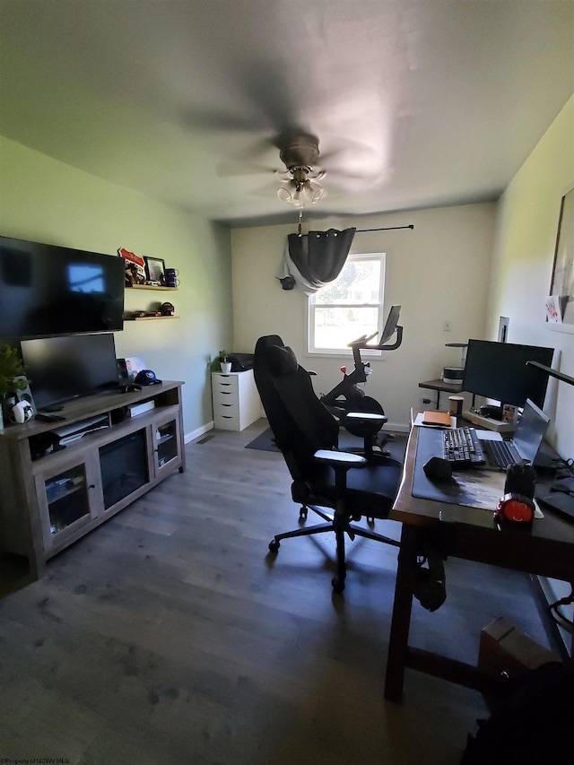 office area with ceiling fan and hardwood / wood-style flooring