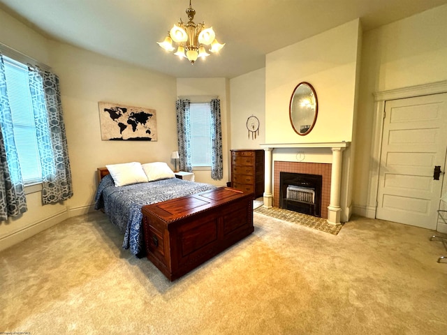 bedroom featuring a chandelier, carpet, multiple windows, and a tile fireplace