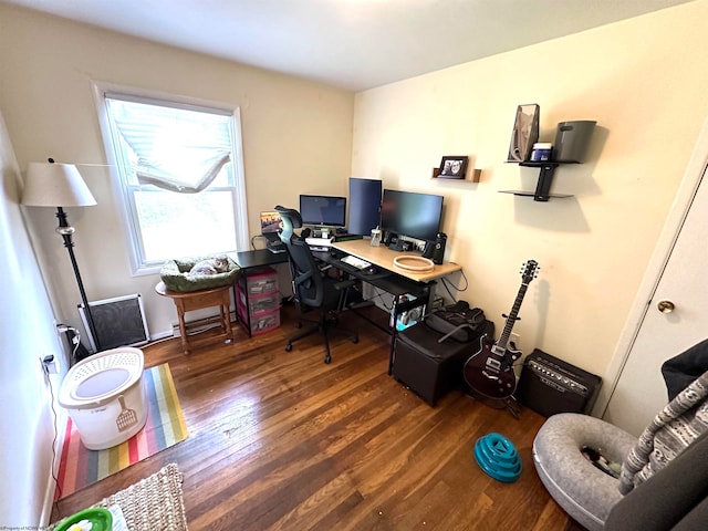 home office with wood-type flooring