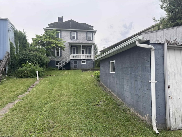 view of yard featuring a porch