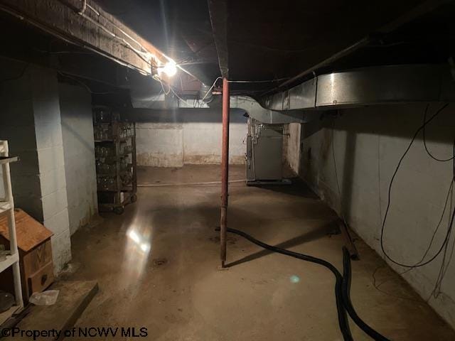 basement featuring heating unit