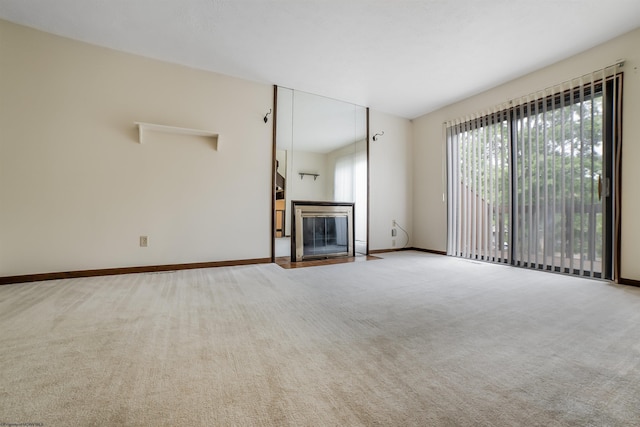 unfurnished living room with carpet floors