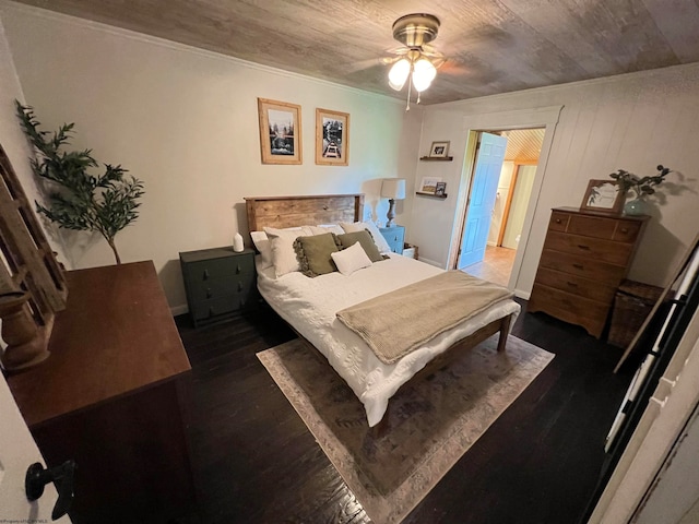 bedroom featuring dark hardwood / wood-style floors and ceiling fan