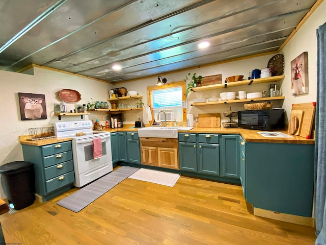 kitchen featuring light wood-type flooring, white range with electric cooktop, and sink