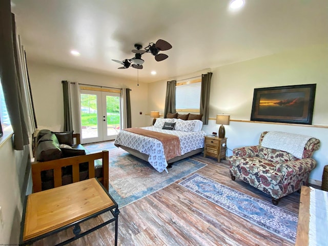 bedroom with hardwood / wood-style floors, ceiling fan, access to exterior, and french doors