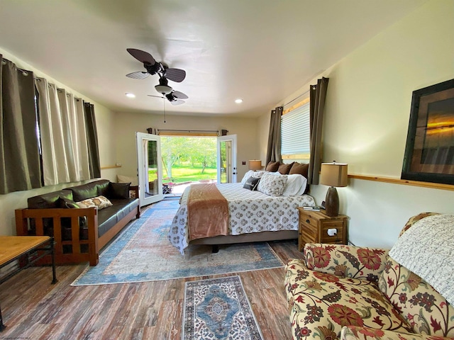 bedroom featuring access to exterior, ceiling fan, and dark wood-type flooring