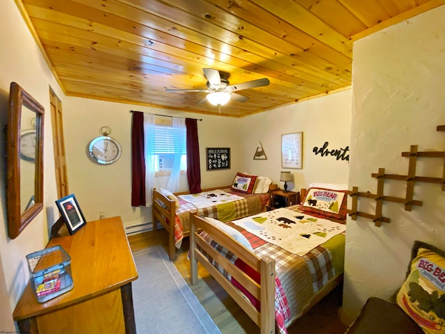 bedroom with baseboard heating, dark wood-type flooring, ceiling fan, crown molding, and wooden ceiling