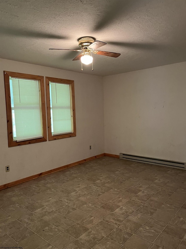 3485 Adolph Rd, Mill Creek, WV 26280 - empty room with baseboard heating, ceiling fan, a textured ceiling, and baseboards