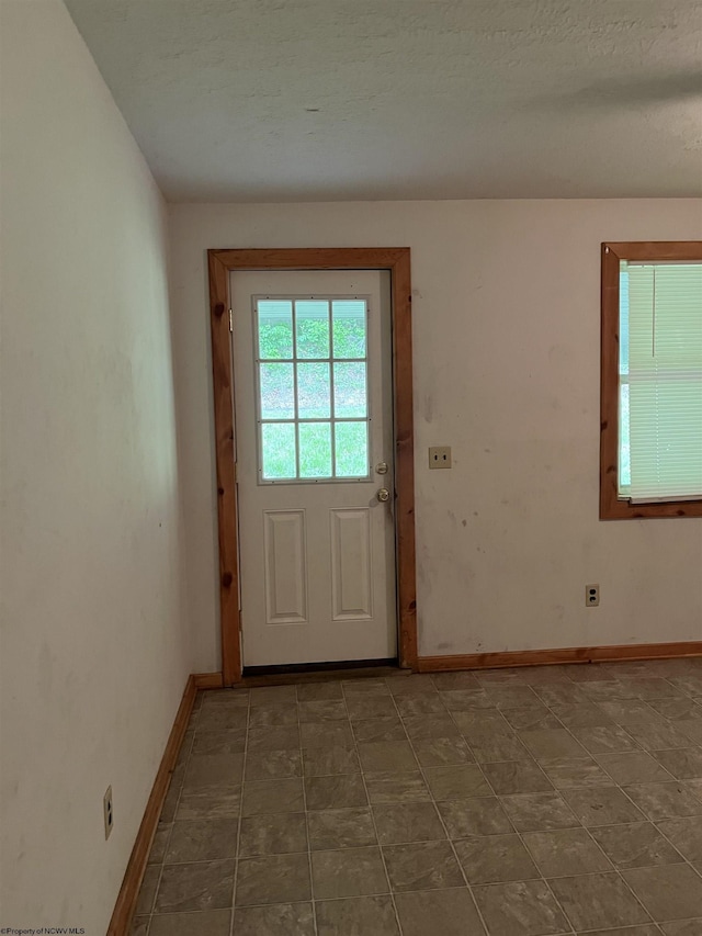 3485 Adolph Rd, Mill Creek, WV 26280 - doorway to outside featuring baseboards