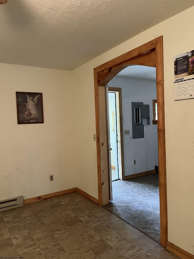 3485 Adolph Rd, Mill Creek, WV 26280 - unfurnished room featuring electric panel, arched walkways, a baseboard radiator, and baseboards