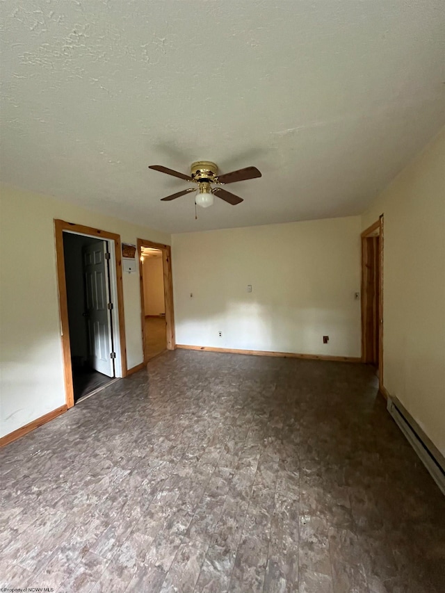 unfurnished bedroom with a baseboard radiator, ceiling fan, and a textured ceiling