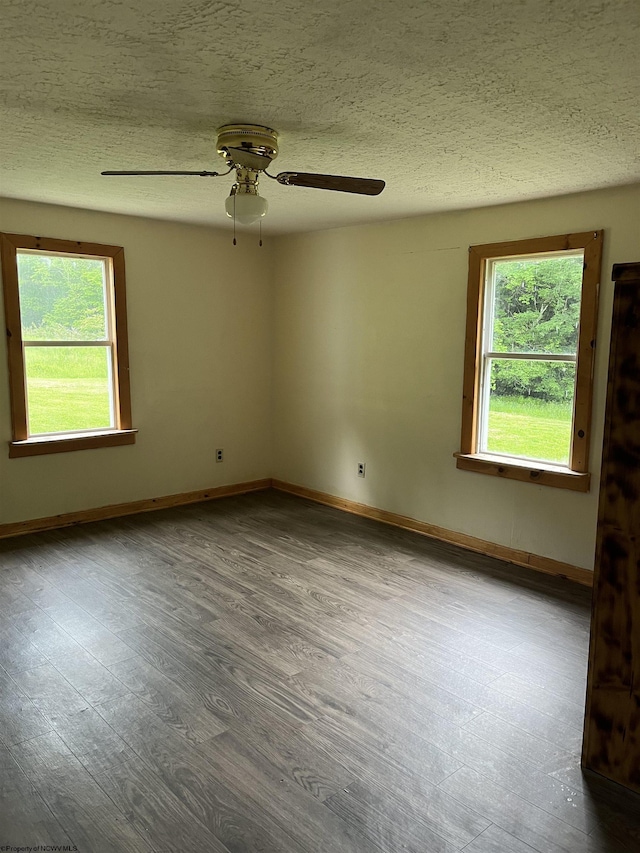 3485 Adolph Rd, Mill Creek, WV 26280 - unfurnished room with healthy amount of natural light, wood finished floors, ceiling fan, and a textured ceiling