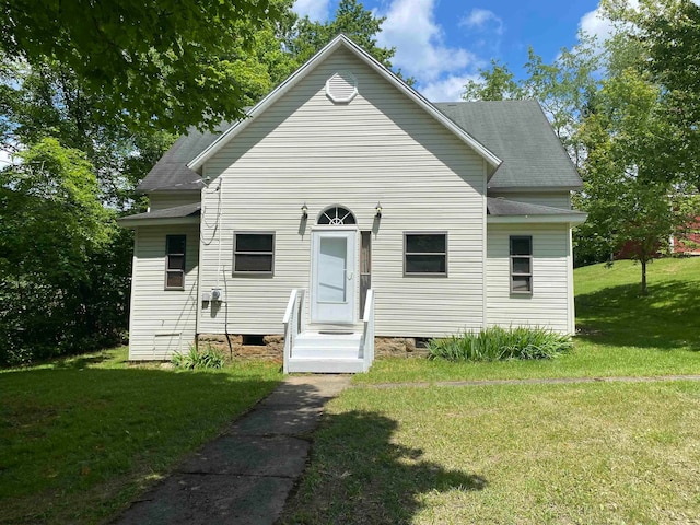 view of front of property with a front lawn