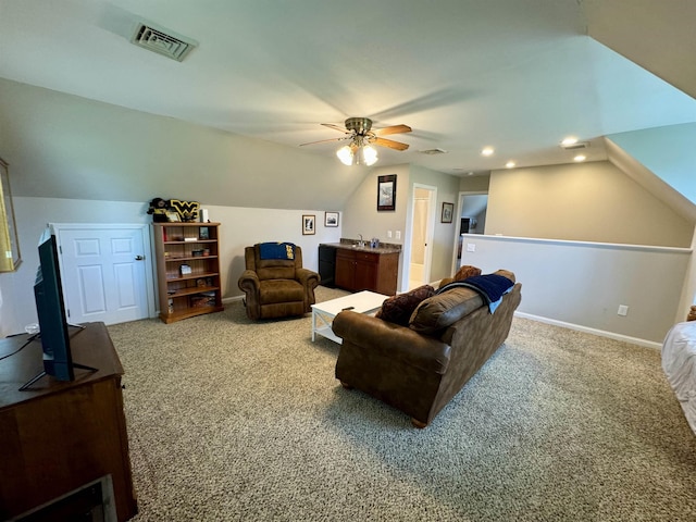 living room with carpet, ceiling fan, and lofted ceiling