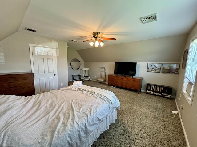 bedroom featuring ceiling fan, carpet floors, and lofted ceiling