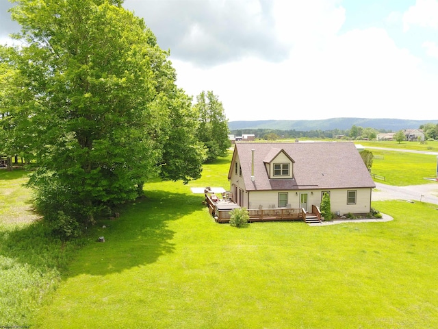 drone / aerial view featuring a mountain view