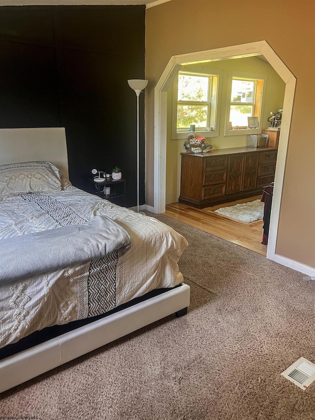 bedroom featuring hardwood / wood-style flooring