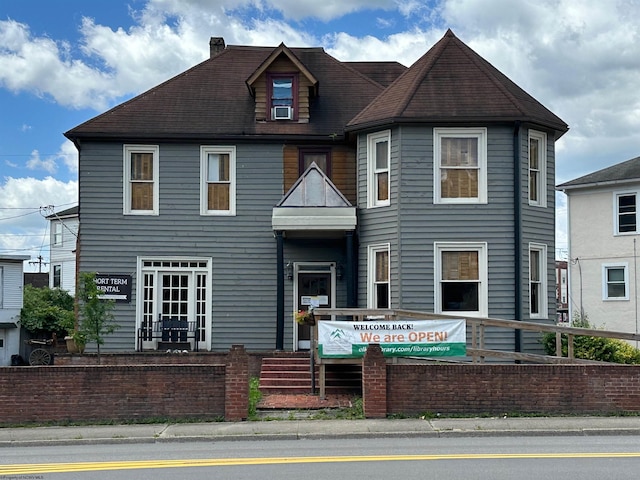 view of front of home featuring cooling unit