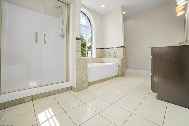 bathroom featuring plus walk in shower and tile patterned floors