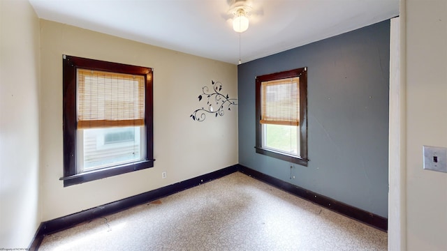 spare room featuring ceiling fan