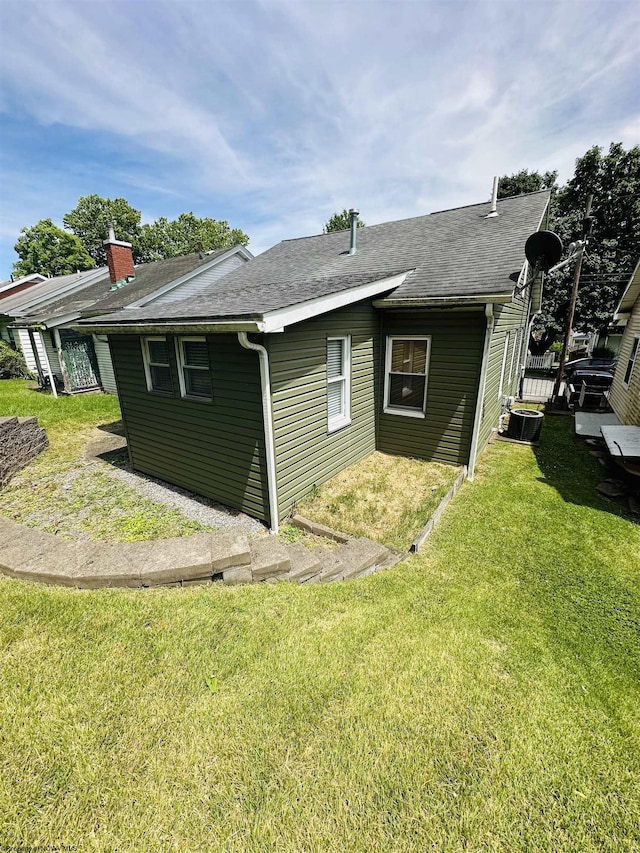 view of home's exterior featuring a yard