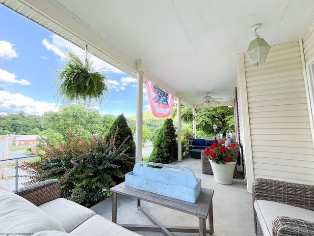 view of patio featuring an outdoor hangout area and ceiling fan