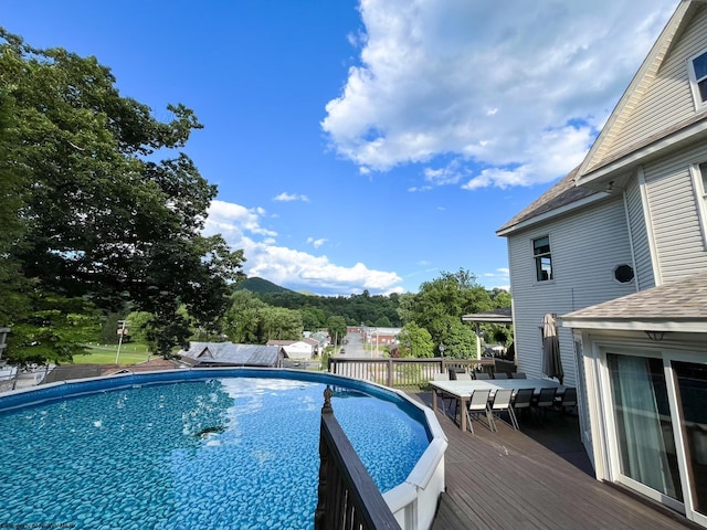 view of pool with a deck