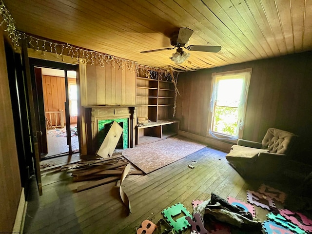 bedroom featuring hardwood / wood-style floors and wooden ceiling